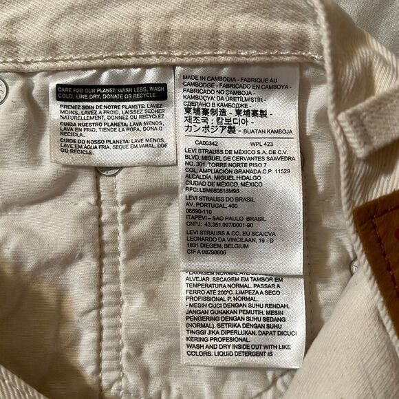 LEVI’S 28 501 High Rise Button Fly Ivory Distressed Raw Fringe Hem Denim Shorts - Picture 12 of 14